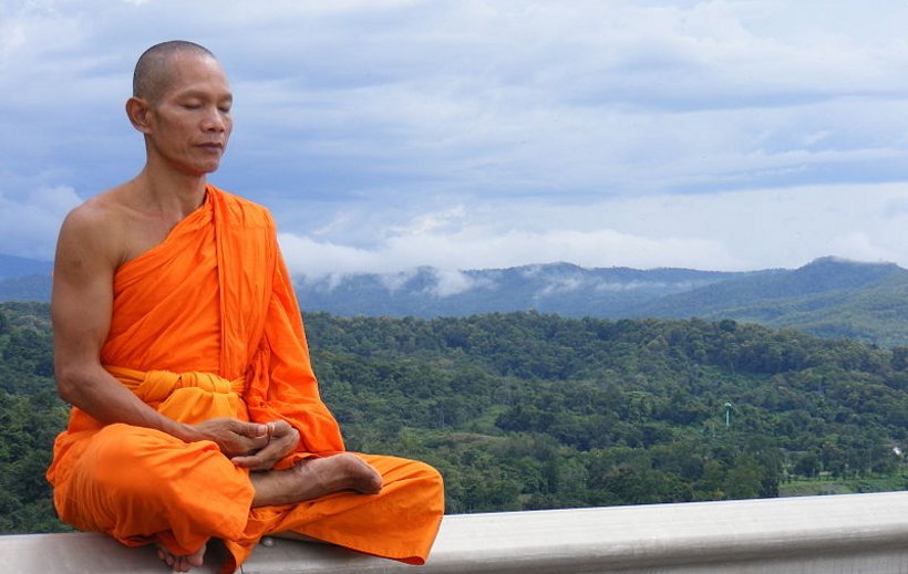 a Buddhist monk meditating